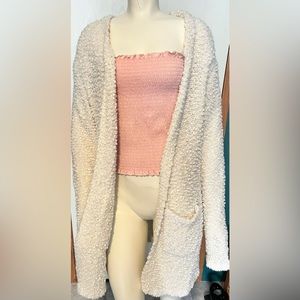 Cream colored Sherpa sweater. Cute and soft.